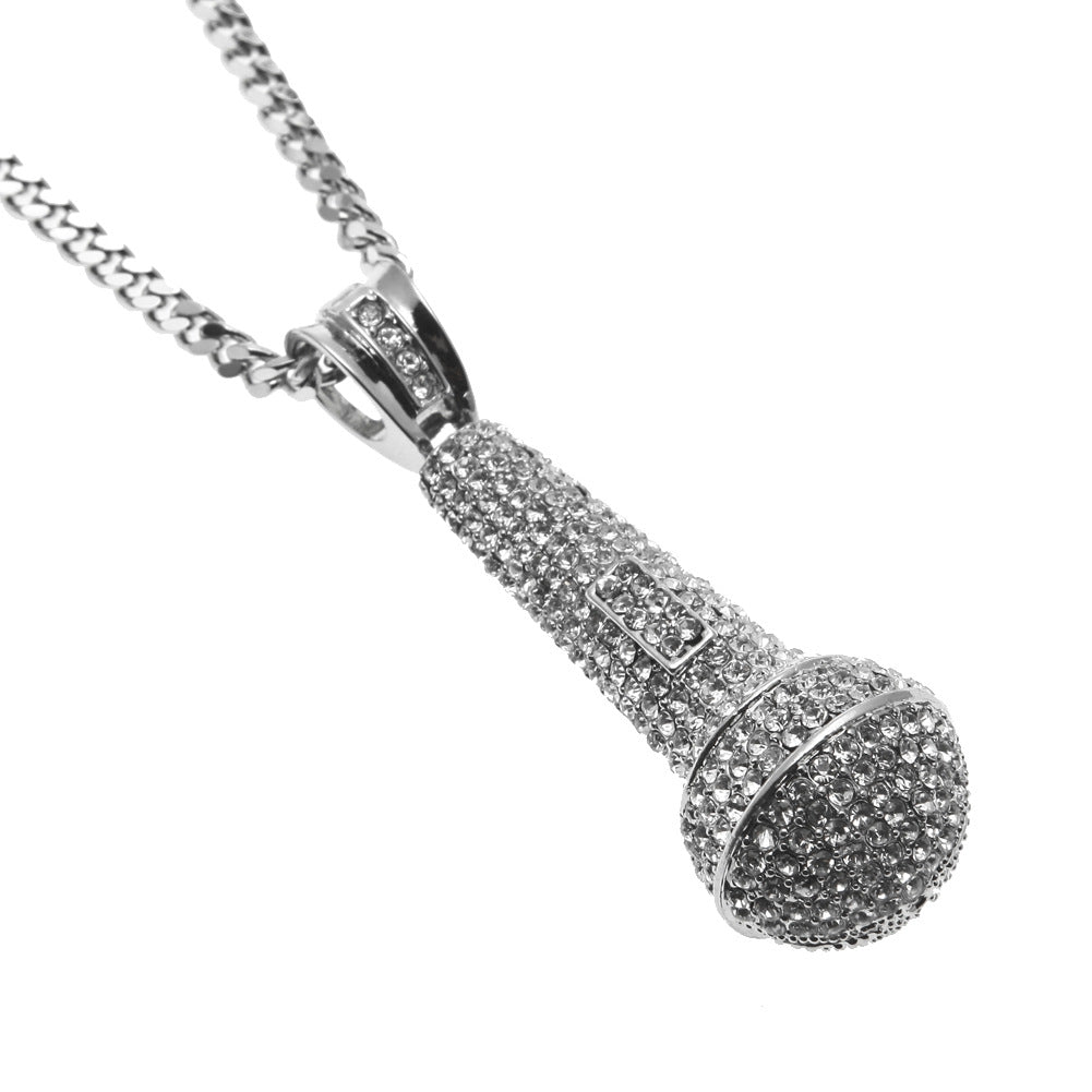 Hip-hop diamond-encrusted microphone necklaces. by nowadaysfashion