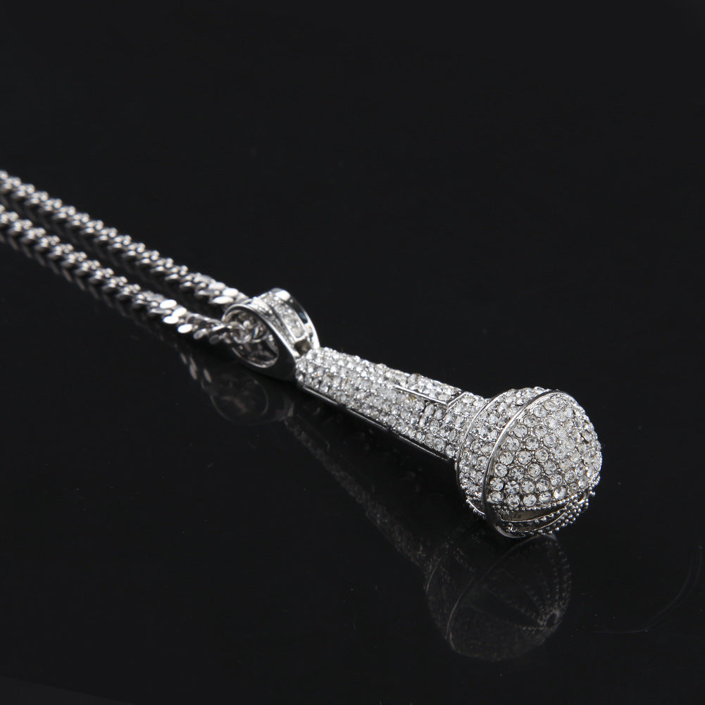 Hip-hop diamond-encrusted microphone necklaces. by nowadaysfashion