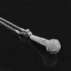 Hip-hop diamond-encrusted microphone necklaces. by nowadaysfashion