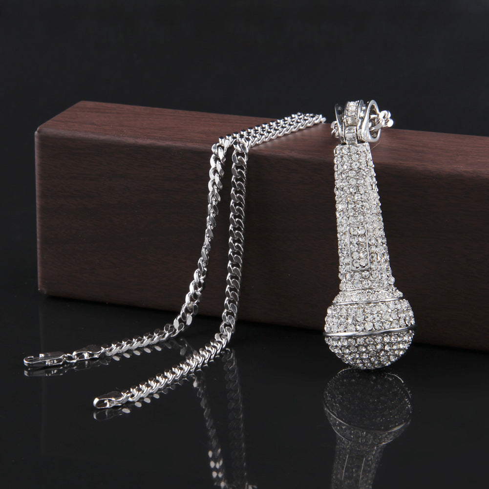 Hip-hop diamond-encrusted microphone necklaces. by nowadaysfashion