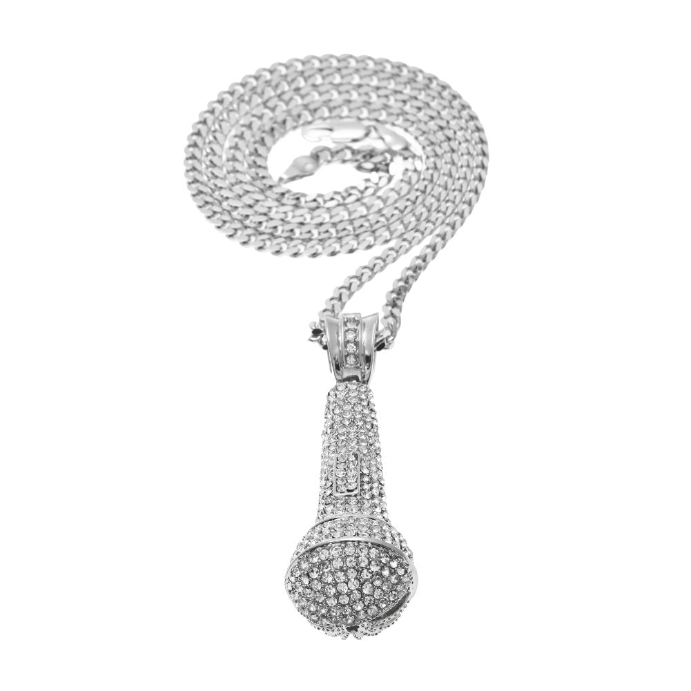 Hip-hop diamond-encrusted microphone necklaces. by nowadaysfashion