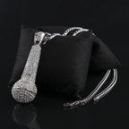 Hip-hop diamond-encrusted microphone necklaces. by nowadaysfashion