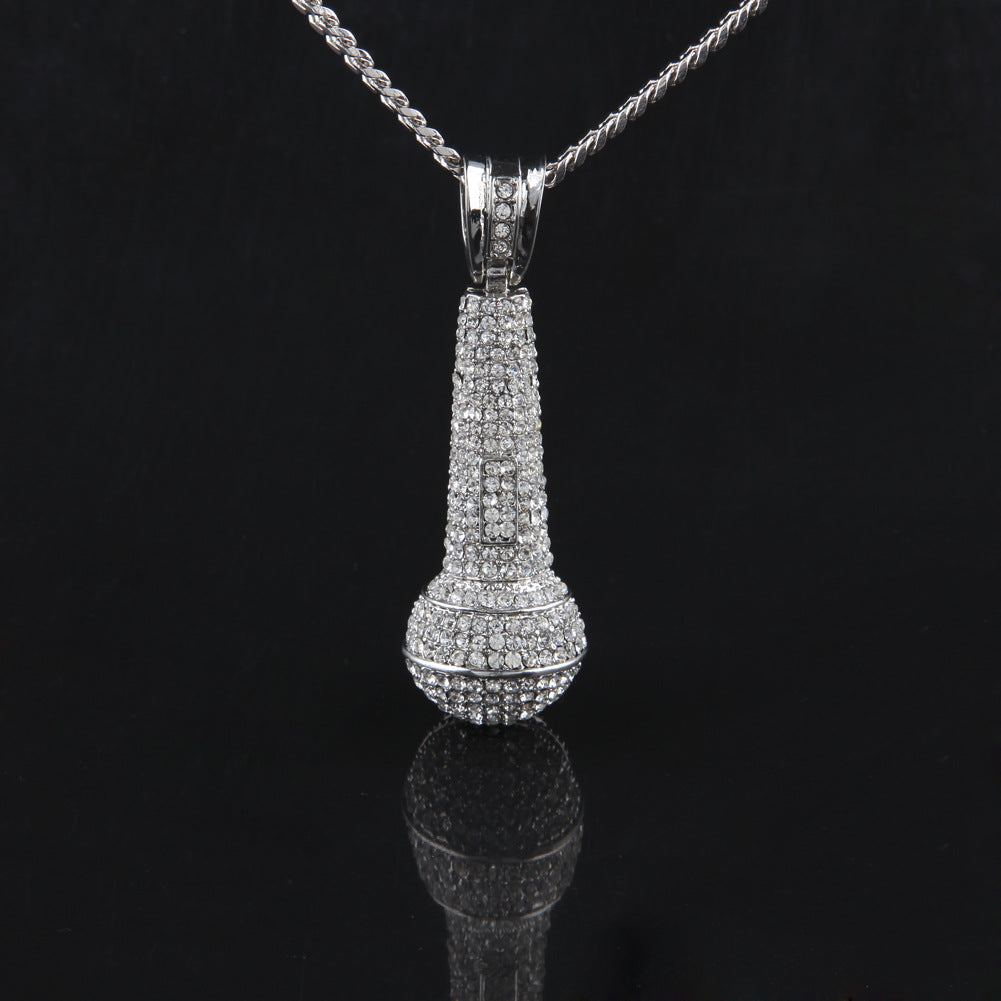 Hip-hop diamond-encrusted microphone necklaces. by nowadaysfashion