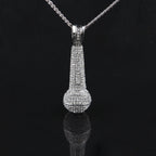 Hip-hop diamond-encrusted microphone necklaces. by nowadaysfashion