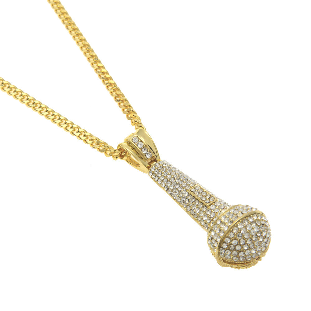 Hip-hop diamond-encrusted microphone necklaces. by nowadaysfashion