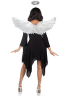 Back view of a person in a black dress wearing silver angel wings and a tinsel halo headband.