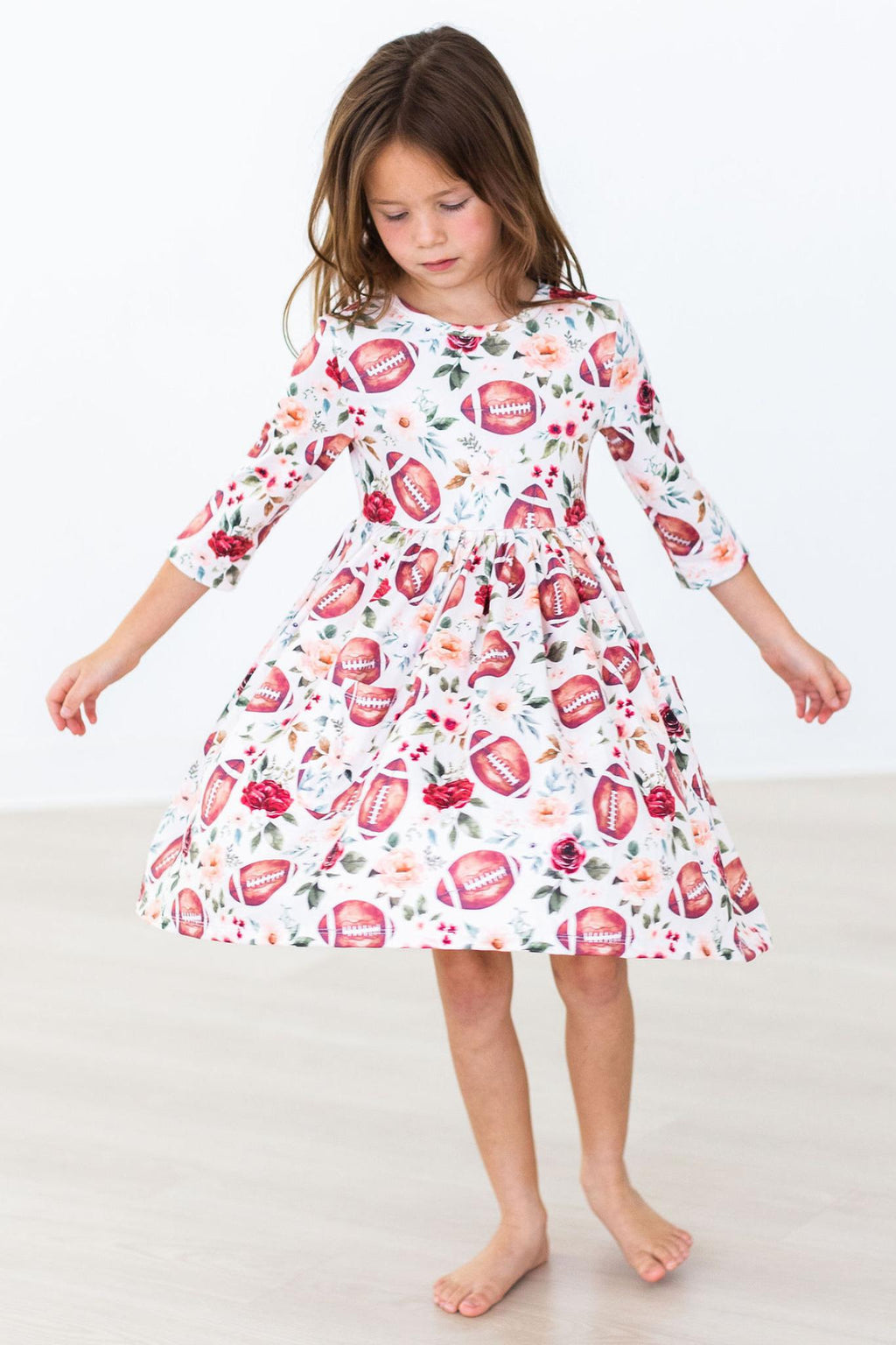 Footballs & Flowers 3/4 Sleeve Pocket Twirl Dress by Mila & Rose ®