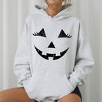Jack-O-Lantern Girl Pumpkin Halloween Spooky Trick Or Treat Witch Hooded Sweatshirt by Refinery No. 1