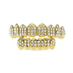 Hip-hop diamond-encrusted and gold-plated teeth grillz by nowadaysfashion
