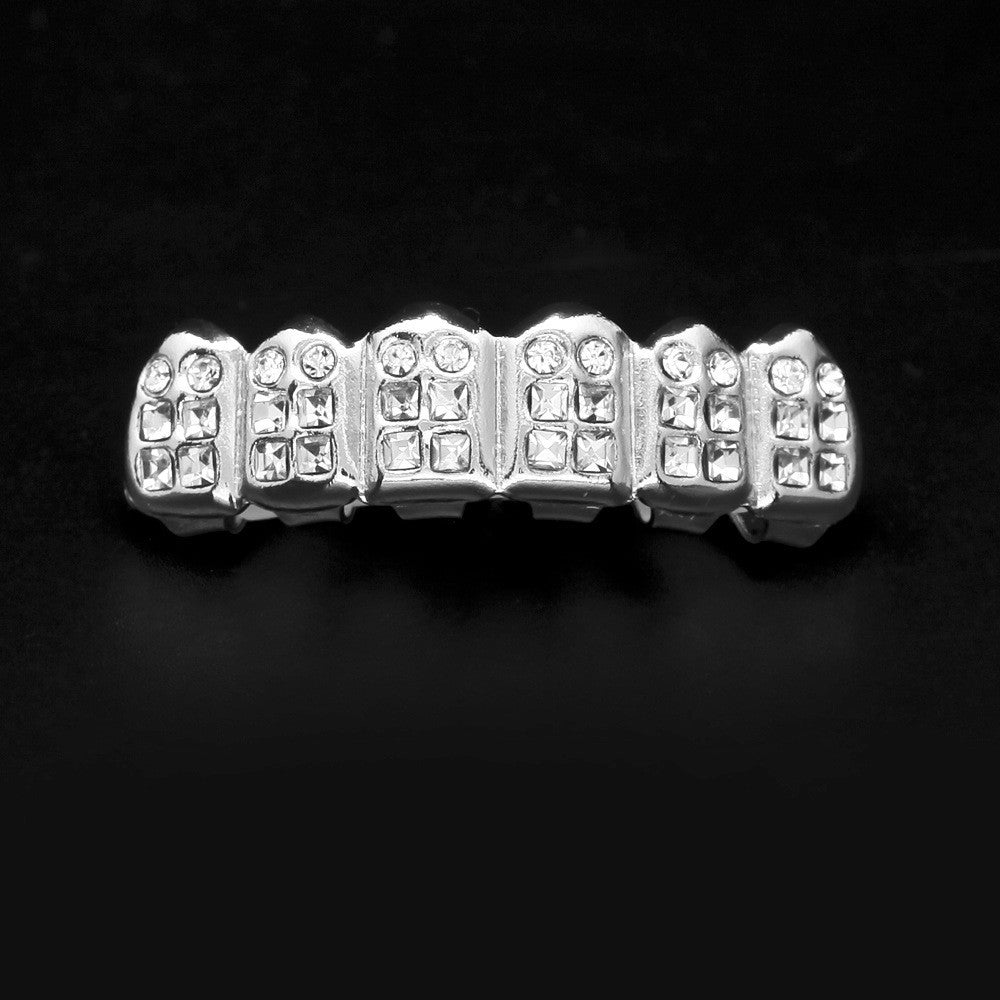 Hip-hop diamond-encrusted and gold-plated teeth grillz by nowadaysfashion