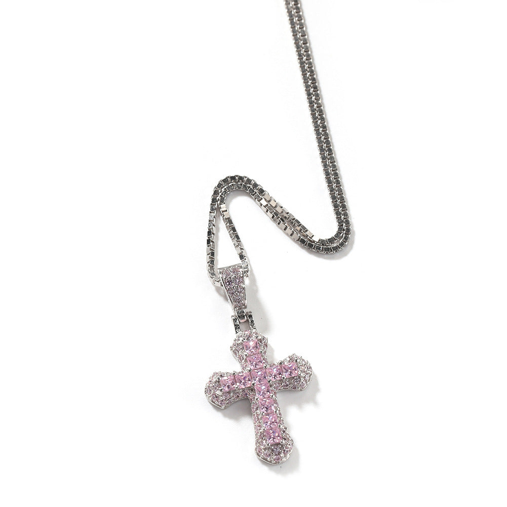 Gold-plated, diamond-encrusted mini cross necklace by nowadaysfashion