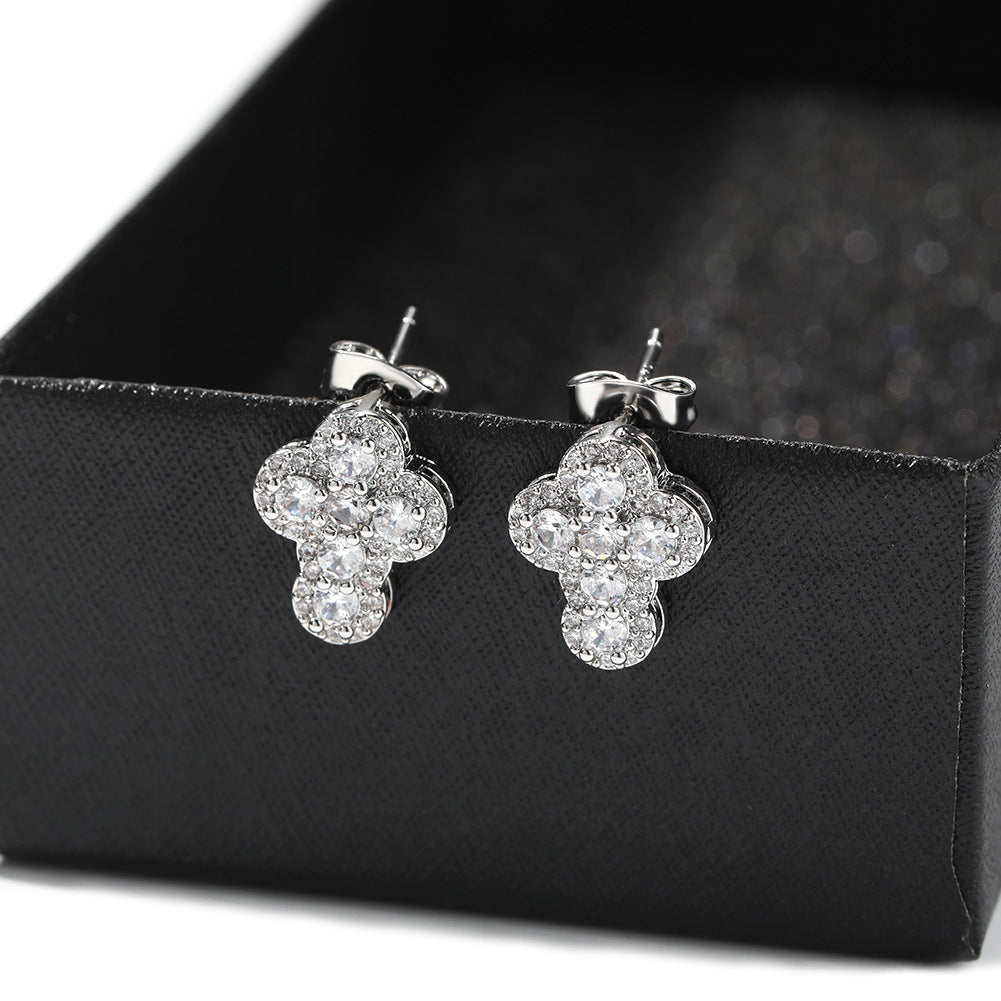 Hip-hop fashion diamond-encrusted cross stud earrings by nowadaysfashion