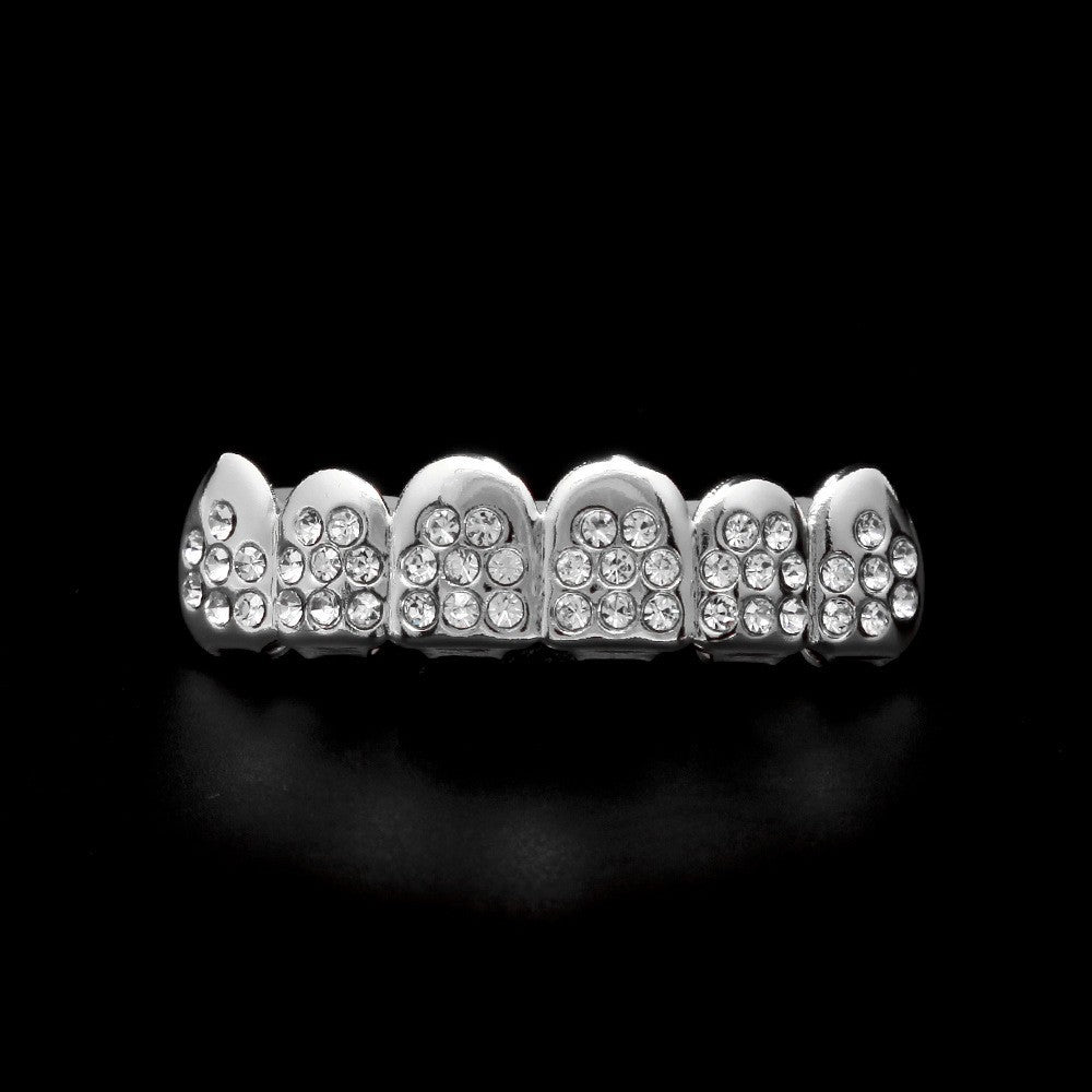 Hip-hop diamond-encrusted and gold-plated teeth grillz by nowadaysfashion