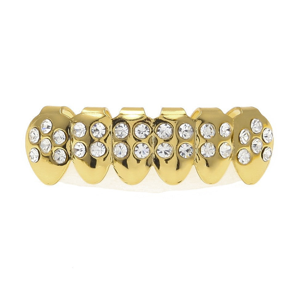Hip-hop diamond-encrusted and gold-plated teeth grillz by nowadaysfashion