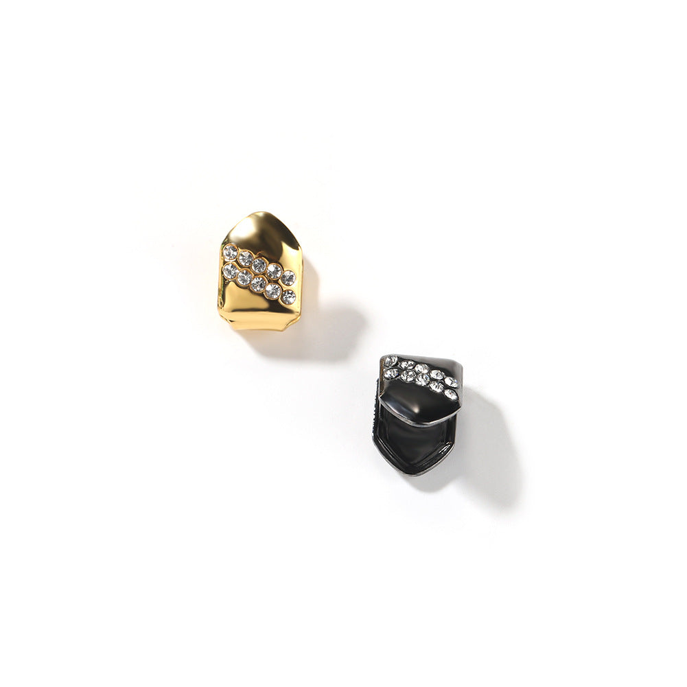 Hip-hop diamond-encrusted and gold-plated teeth grillz by nowadaysfashion