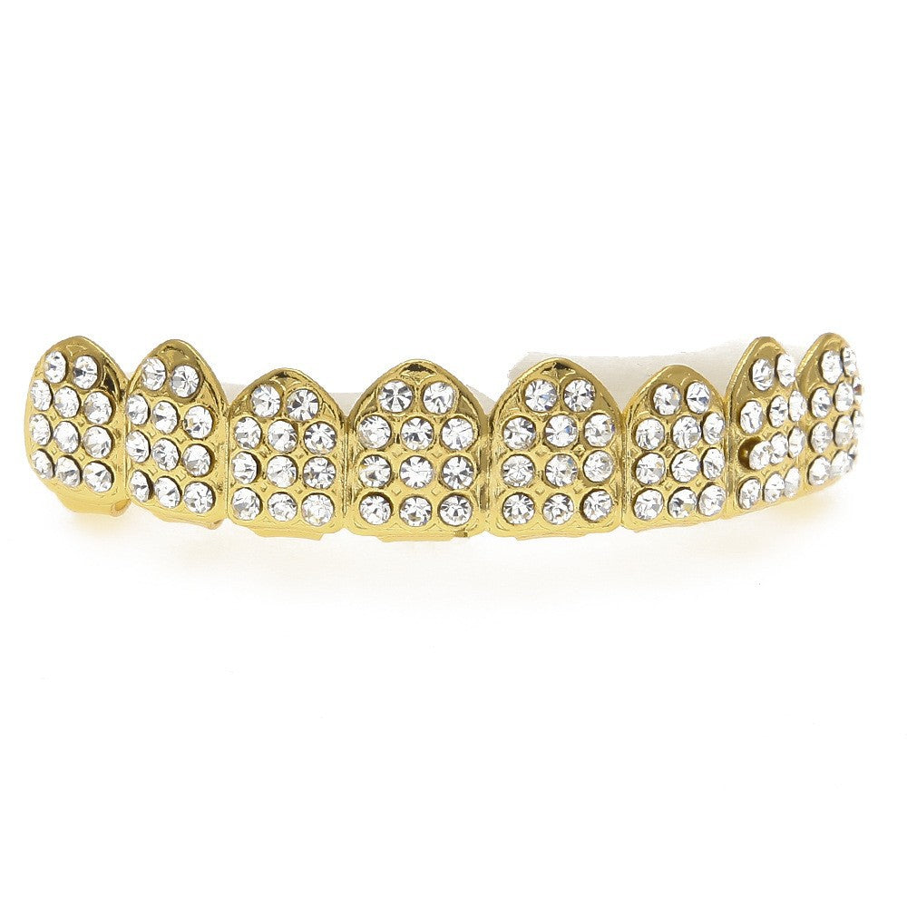 Hip-hop diamond-encrusted and gold-plated teeth grillz by nowadaysfashion