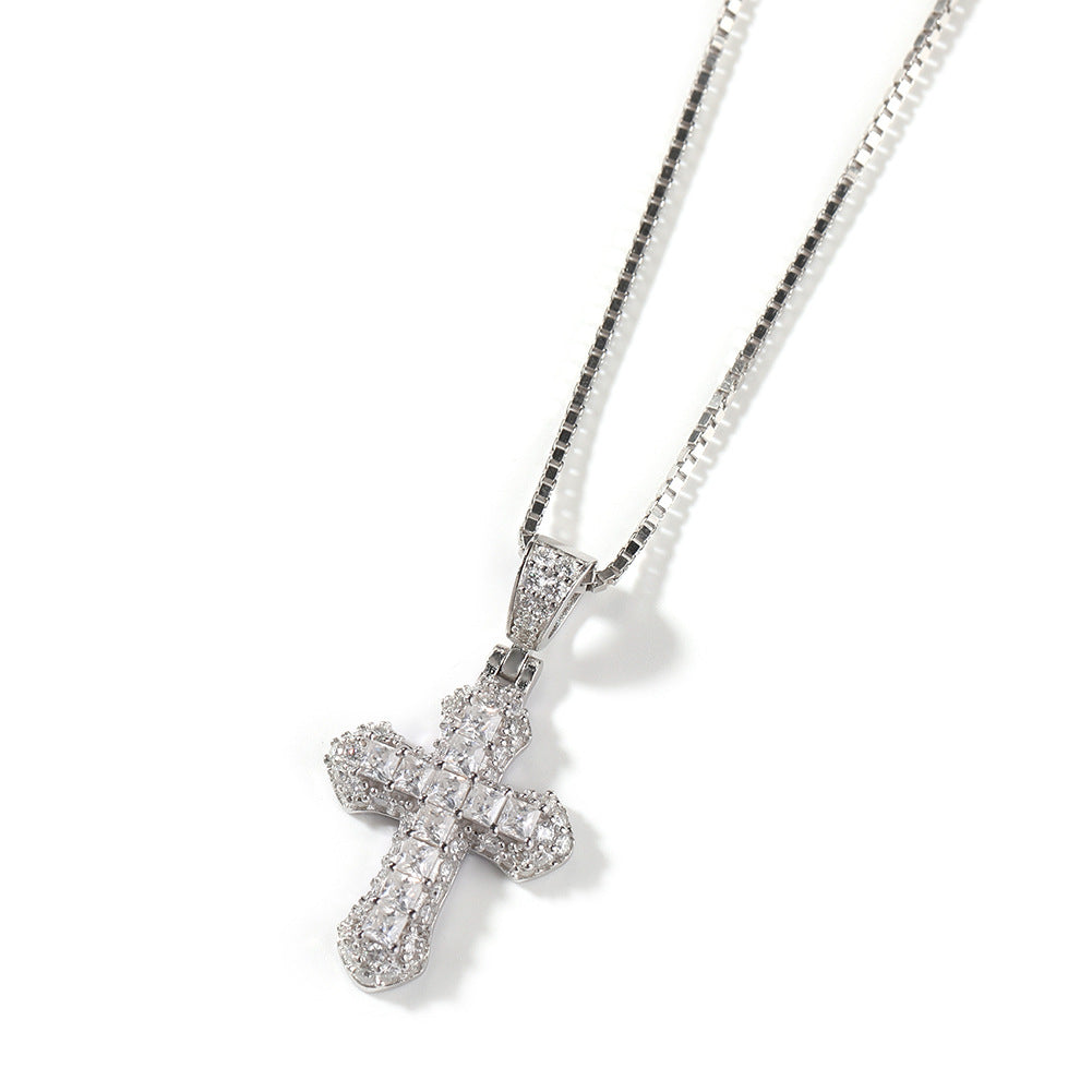 Gold-plated, diamond-encrusted mini cross necklace by nowadaysfashion