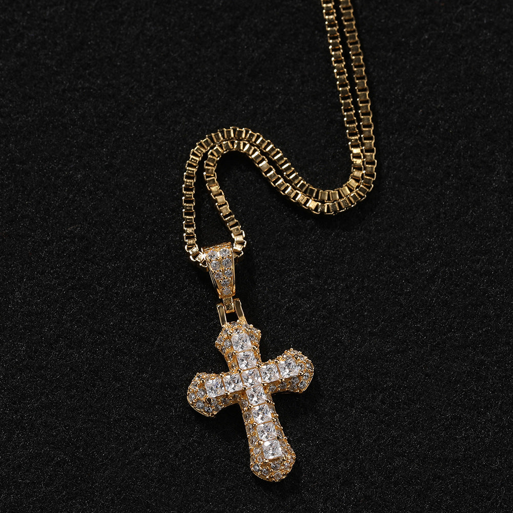 Gold-plated, diamond-encrusted mini cross necklace by nowadaysfashion