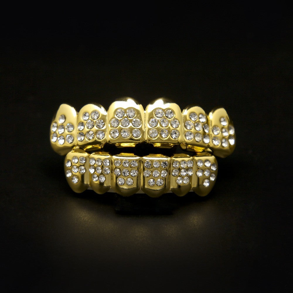 Hip-hop diamond-encrusted and gold-plated teeth grillz by nowadaysfashion