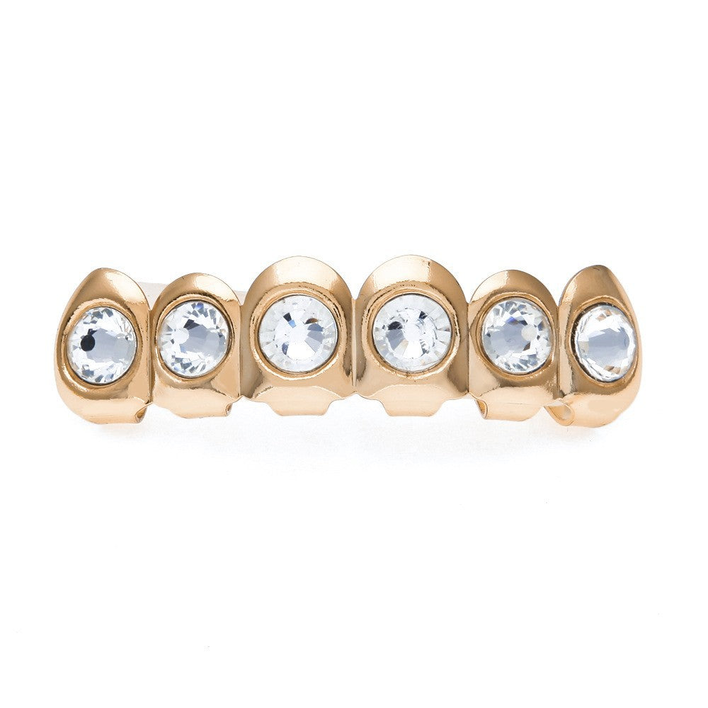 Hip-hop diamond-encrusted and gold-plated teeth grillz by nowadaysfashion