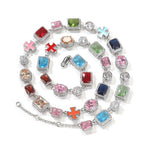Exquisite diamond-encrusted colored gemstone bracelet and necklace by nowadaysfashion