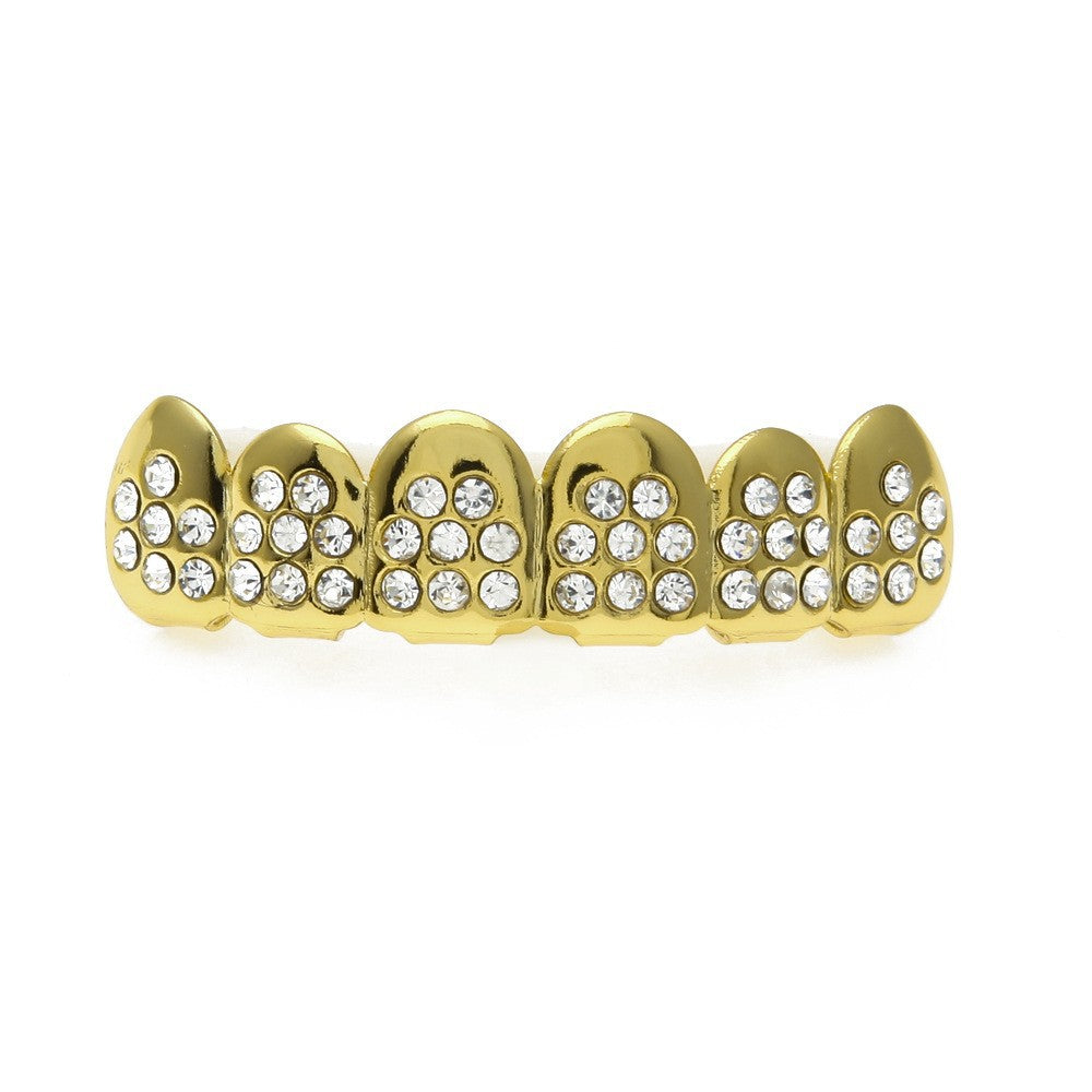 Hip-hop diamond-encrusted and gold-plated teeth grillz by nowadaysfashion
