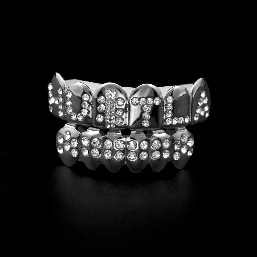 Hip-hop diamond-encrusted and gold-plated teeth grillz by nowadaysfashion
