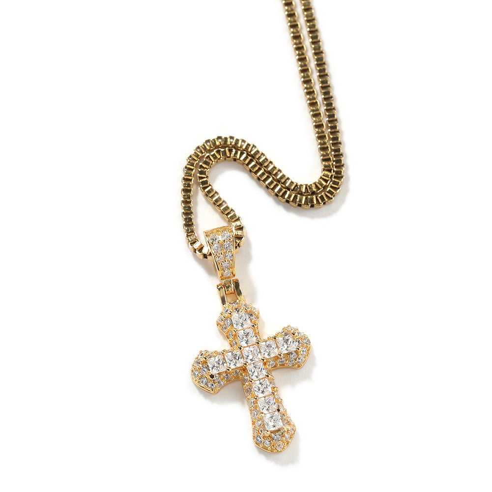 Gold-plated, diamond-encrusted mini cross necklace by nowadaysfashion