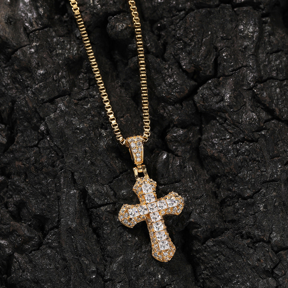 Gold-plated, diamond-encrusted mini cross necklace by nowadaysfashion