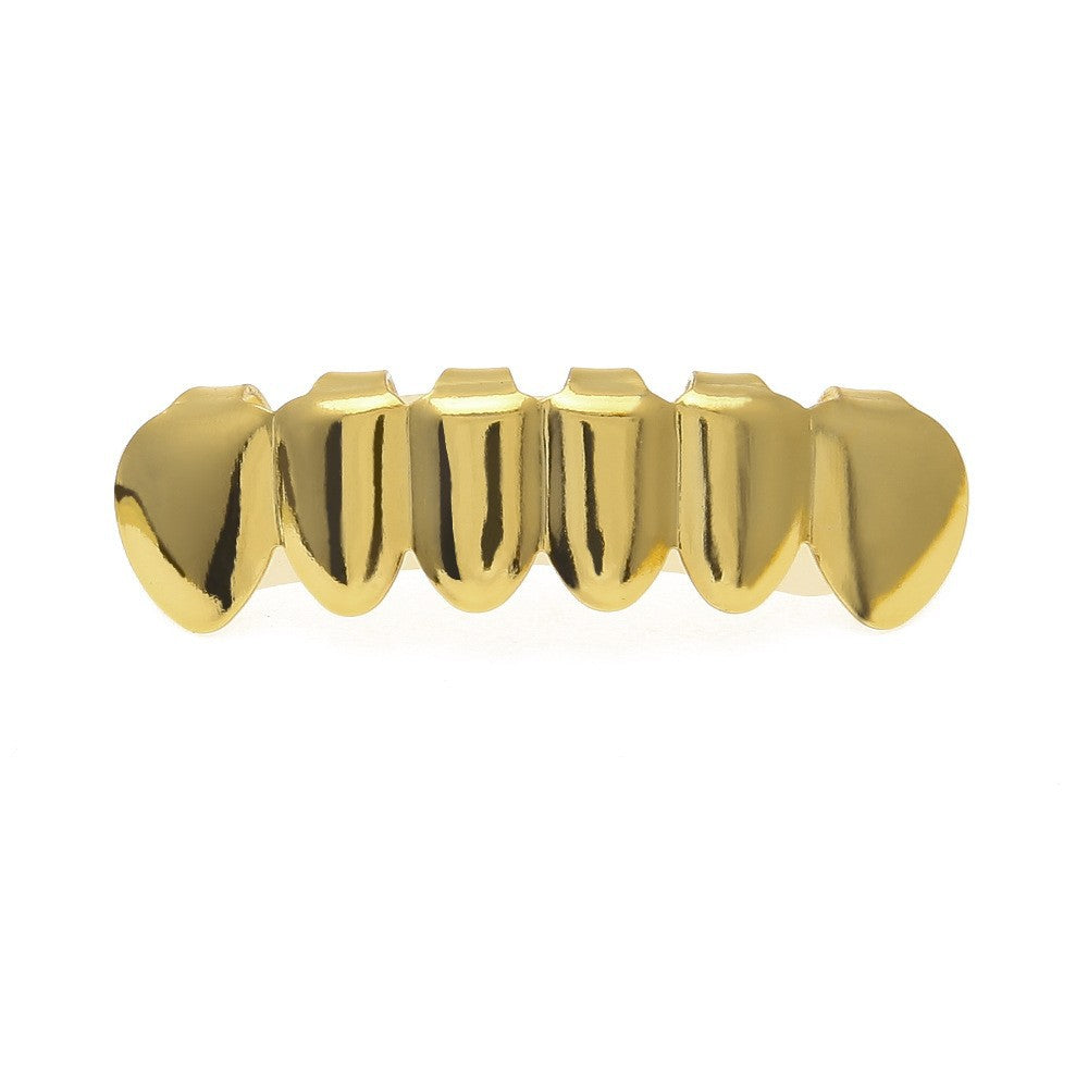 Hip-hop diamond-encrusted and gold-plated teeth grillz by nowadaysfashion