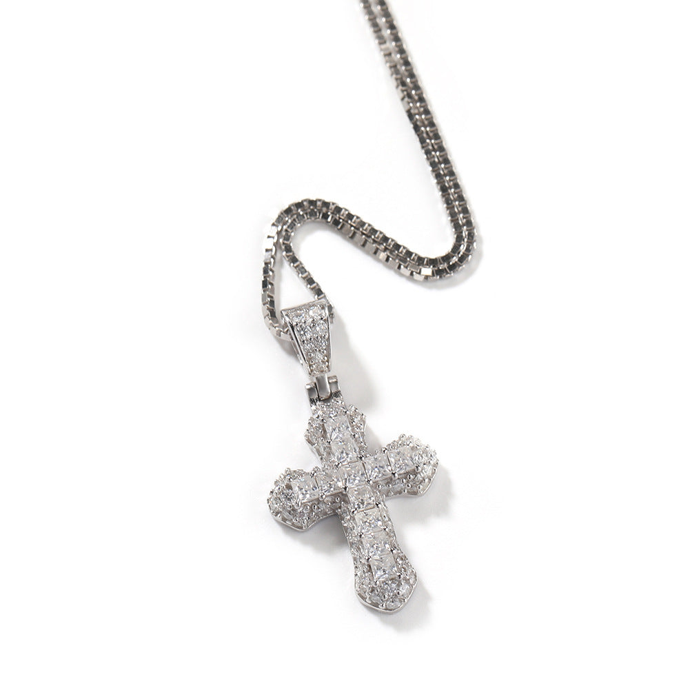Gold-plated, diamond-encrusted mini cross necklace by nowadaysfashion