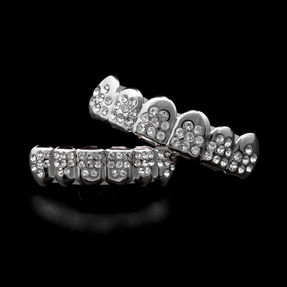 Hip-hop diamond-encrusted and gold-plated teeth grillz by nowadaysfashion