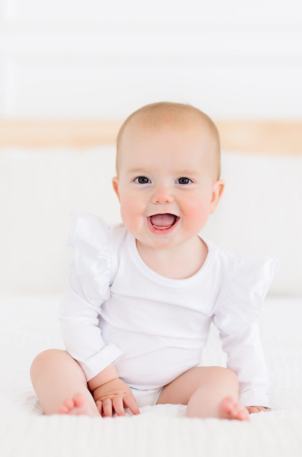 White L/S Flutter Bodysuit by Mila & Rose ®