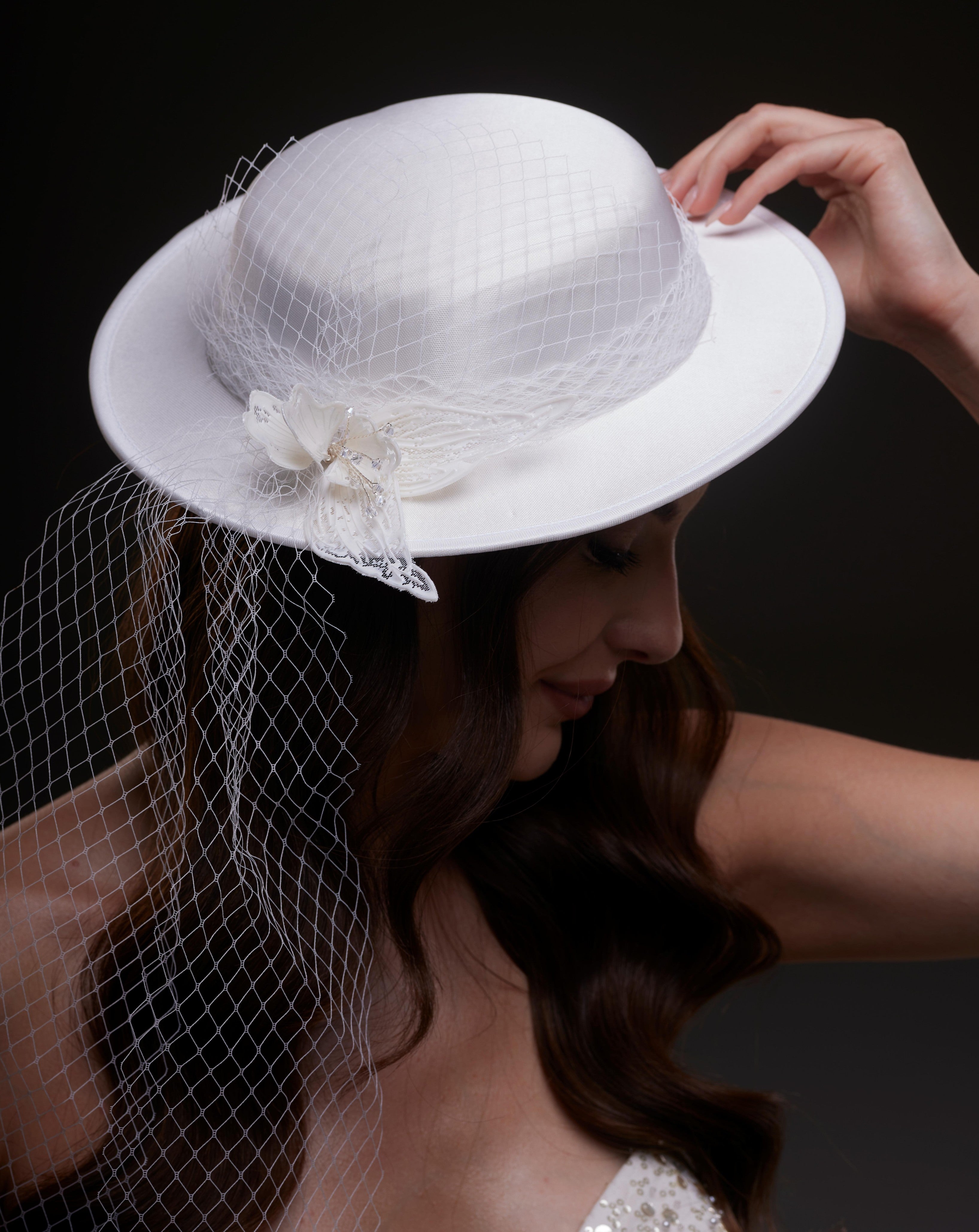 White Satin Hat with Flower and Veil Netting by Bridal Port