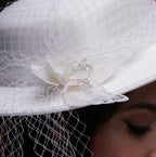 White Satin Hat with Flower and Veil Netting by Bridal Port