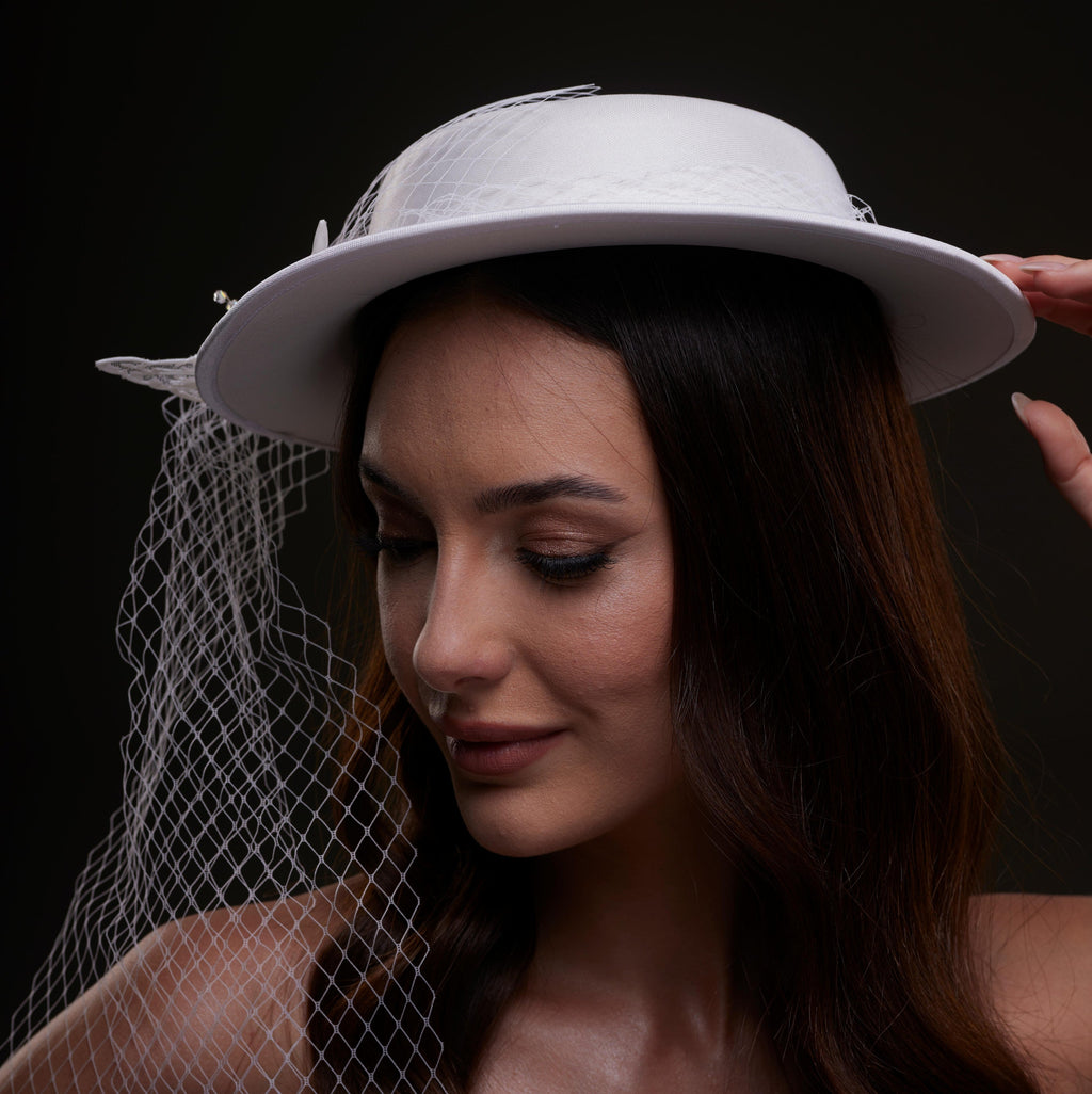 White Satin Hat with Flower and Veil Netting by Bridal Port