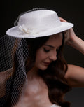 White Satin Hat with Flower and Veil Netting by Bridal Port