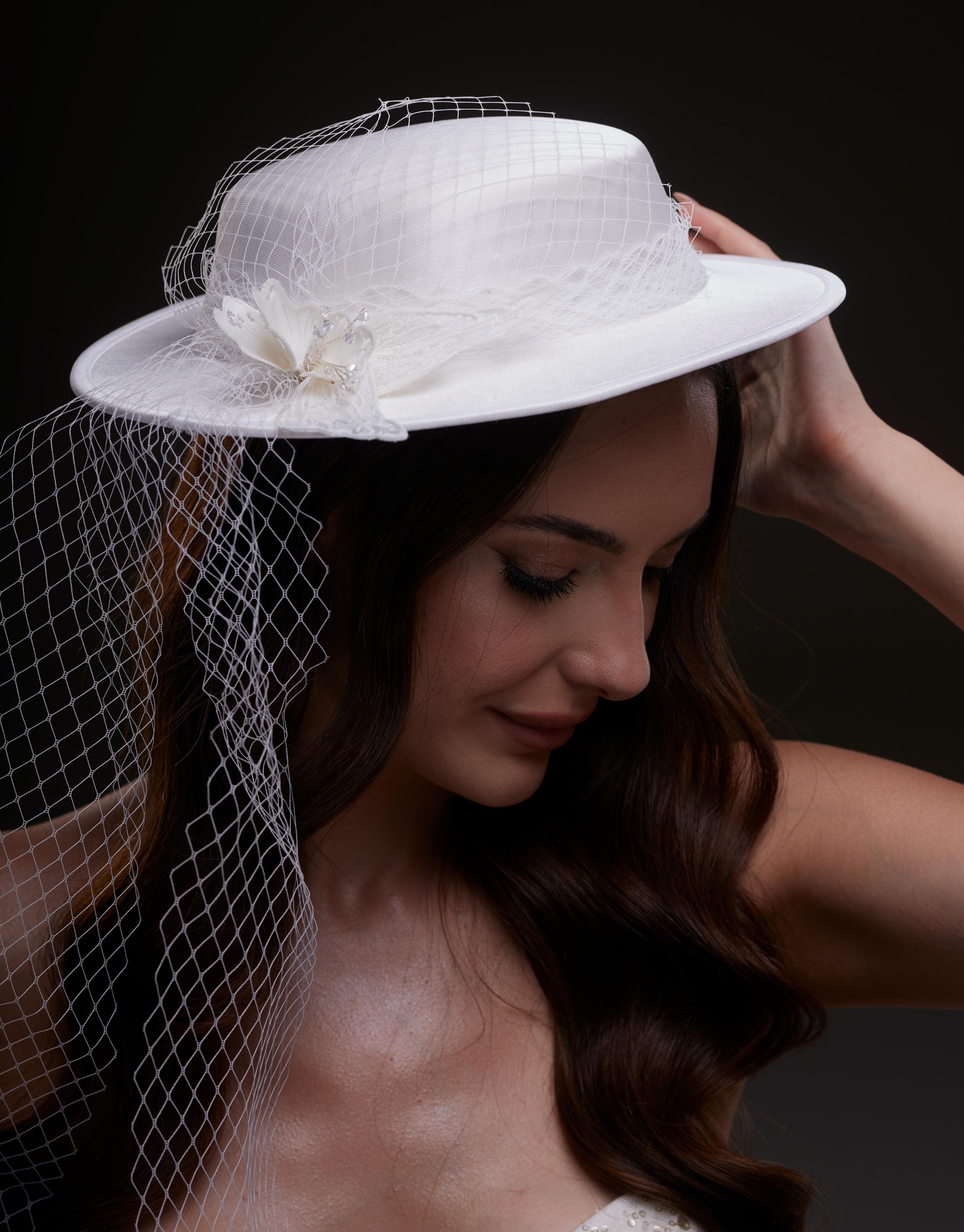 White Satin Hat with Flower and Veil Netting by Bridal Port
