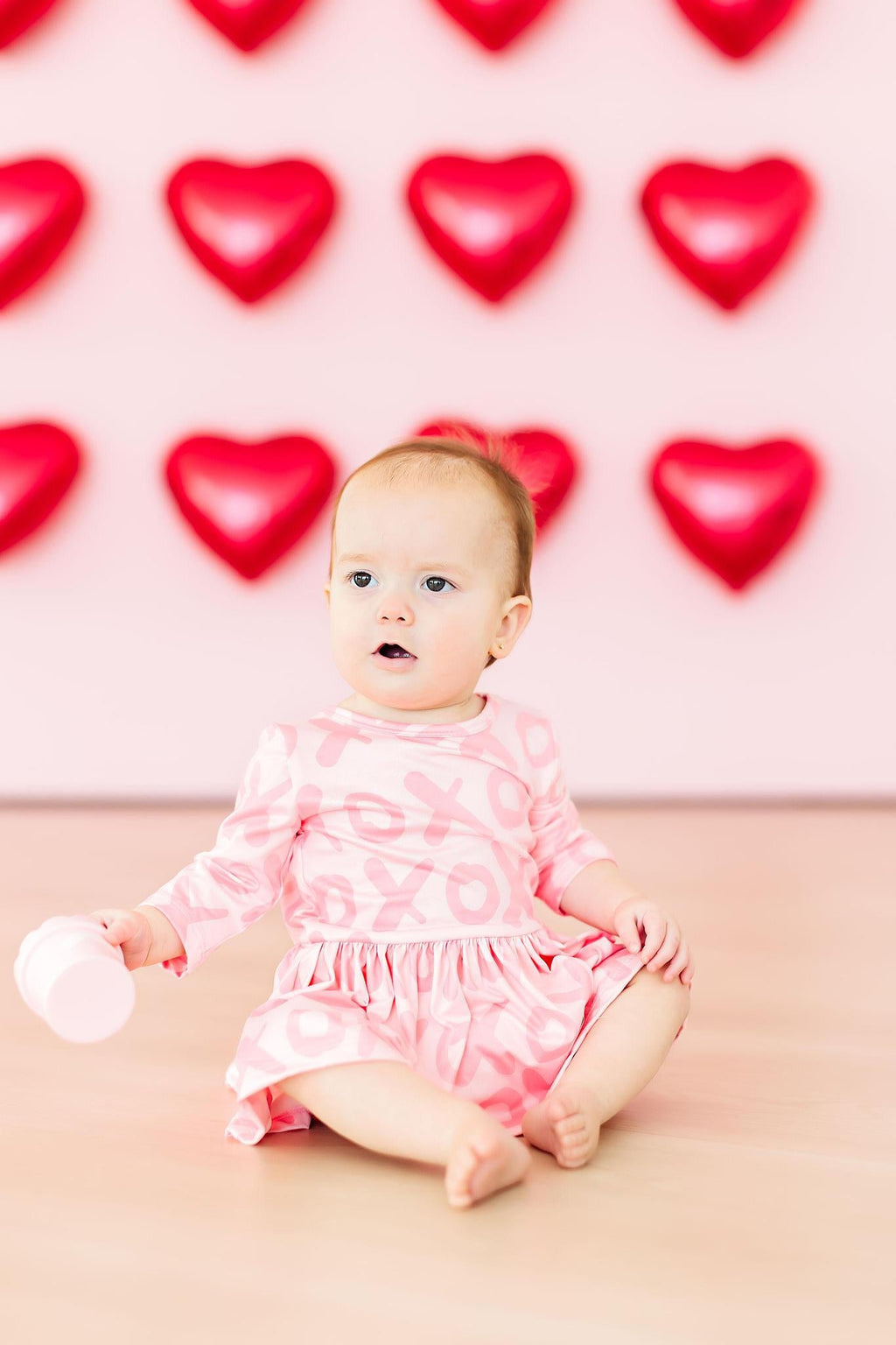 XOXO 3/4 Sleeve Twirl Bodysuit by Mila & Rose ®