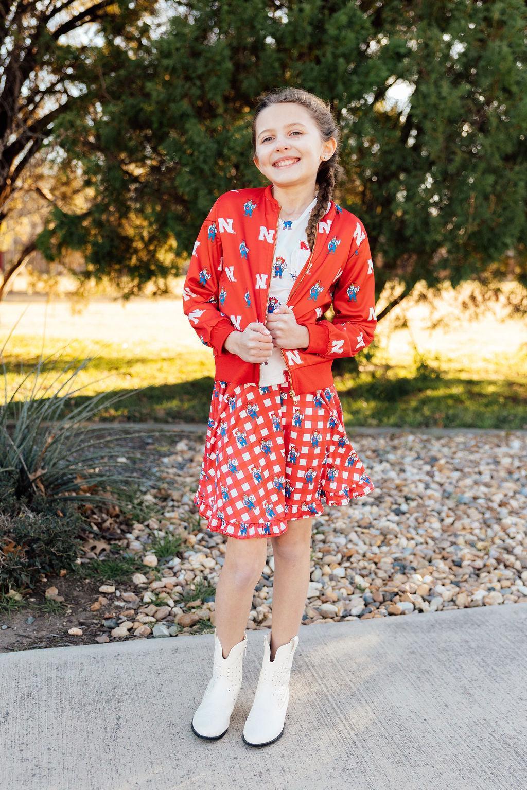 Nebraska White Herbie Husker Ruffle Pocket Tee by Mila & Rose ®
