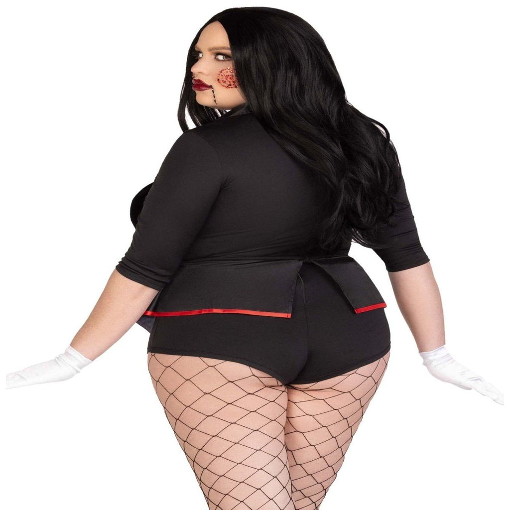 Plus-size model in black tuxedo bodysuit with red trim, bow tie, and fishnet tights