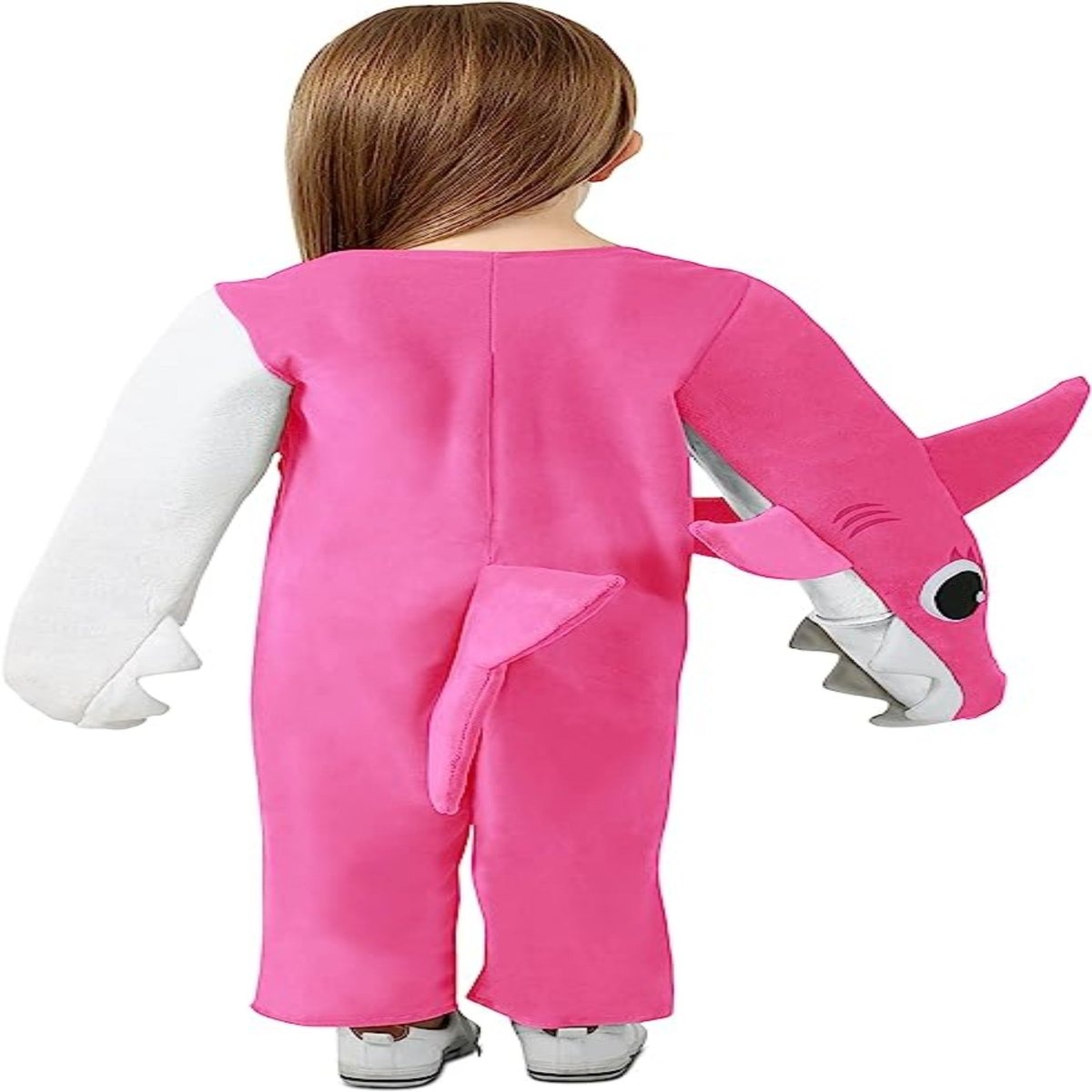 Child wearing pink PinkFong Chompin' Mommy Shark costume, plush onesie with shark head on sleeve and tail, back view.