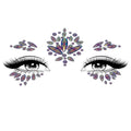 Verity iridescent adhesive face jewels sticker around eyes and forehead for festival makeup.